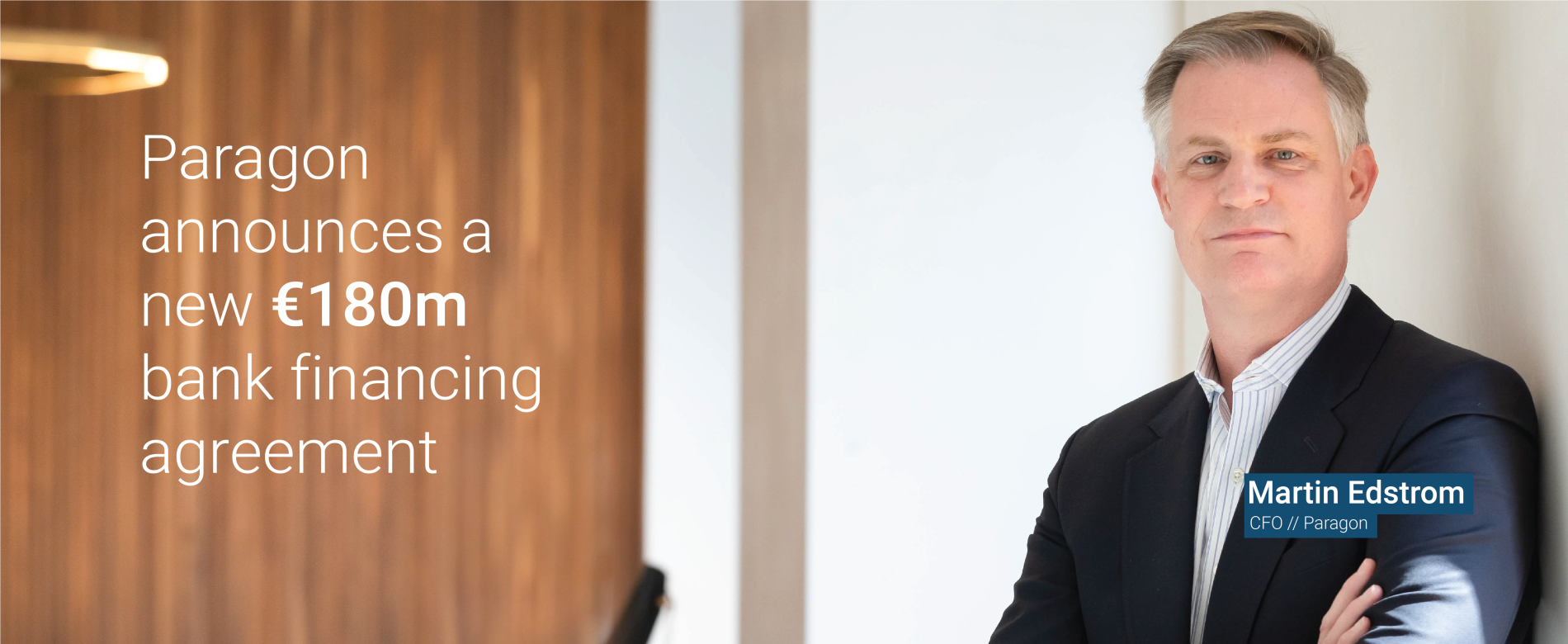 Martin CFO announcement standing by a door