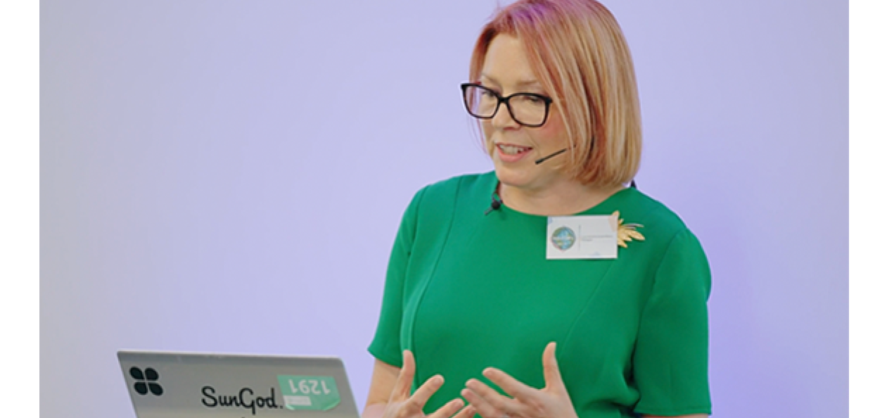 Lucy Klinkenberg speaking to an audience at Paragon Presents event