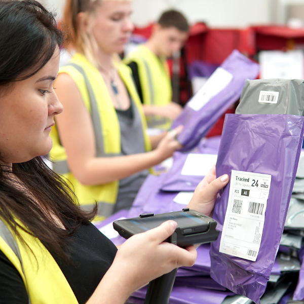 Woman scanning a package