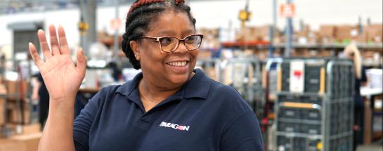 Paragon employee waving and smiling