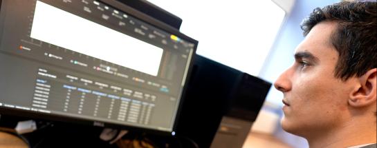 Man looking at computer screen